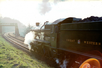 Heading into the setting sun, 7029 Clun Castle sounds to be in difficulty climbing Gresford Bank on Saturday 4th March 1967