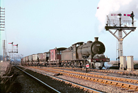 In the spring of 1967 J27 65894 is pictured at Ryehope Grange, the junction for Sunderland South Dock.