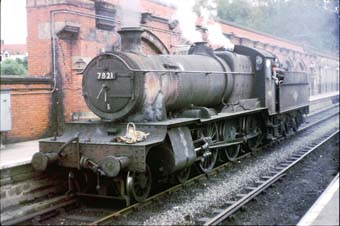 7821 looks in a very poor condtion on 26th August 1965 at Shrewsbury, however in a few minutes time it will head the down Cambrian Coast Express.