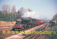 A King hauled express on the Birmingham line at Lapworth in 1961.