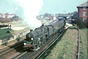 73084 pulls away from Christchurch towards Bournemouth in 1965.